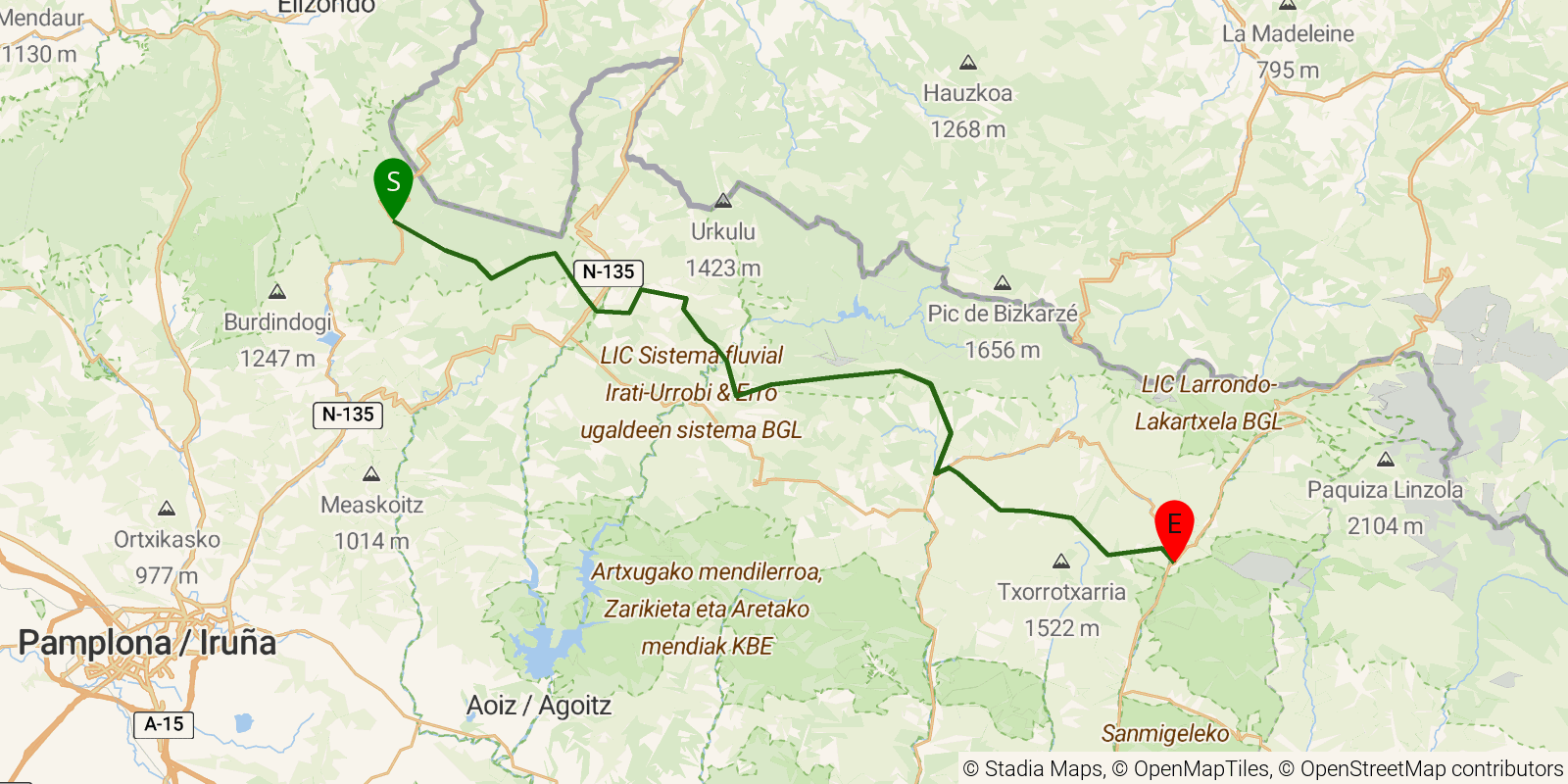 Route map of the GR11 Senda Pirenaica — Stages 4–7: Puerto de Urkiaga to Isaba on OpenStreetMap terrain